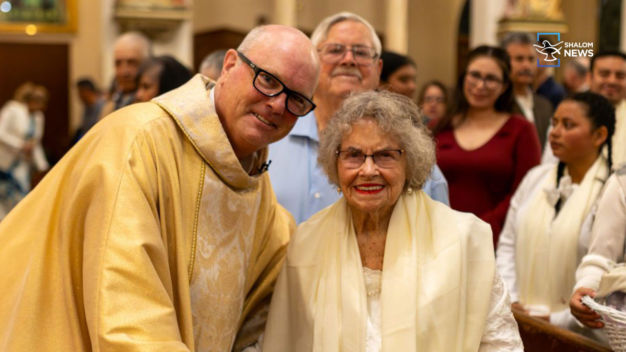 98 year old Virginia receives baptism son becomes godfather